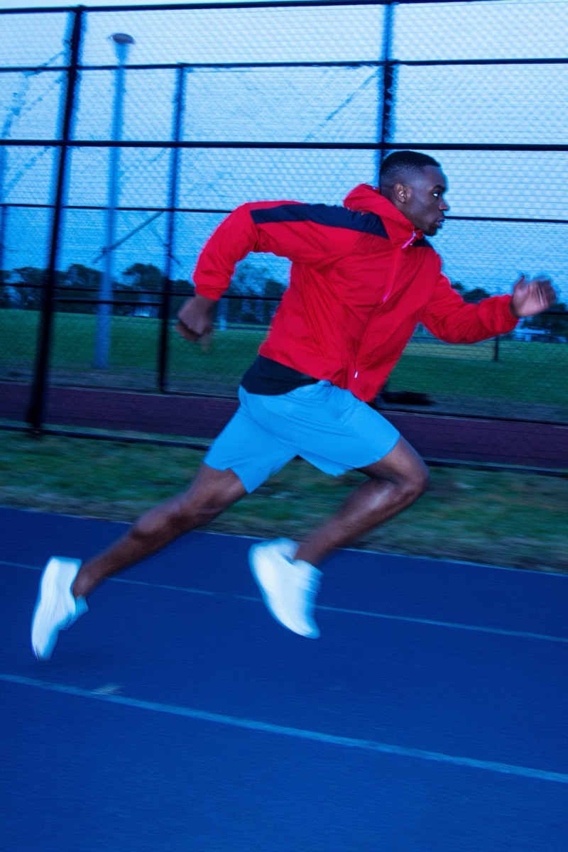 Blue Track Sprint · by NowhereManGo · sprinter, red windbreaker, blue running track