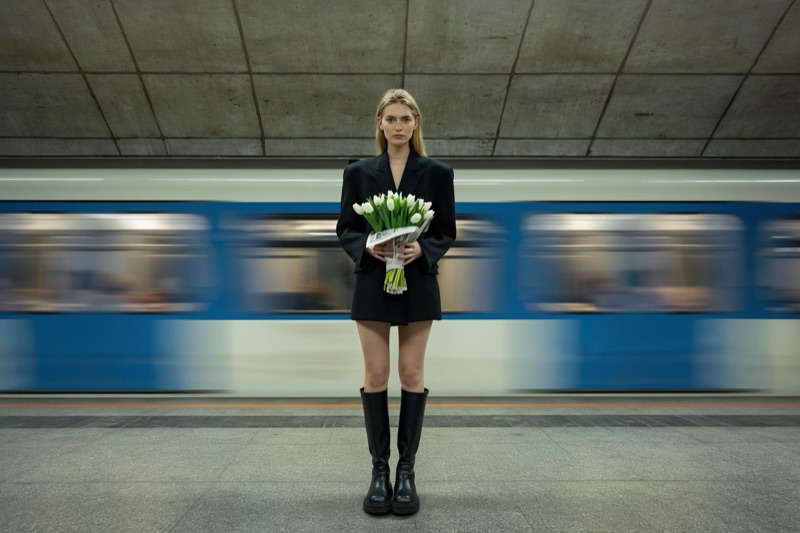 Platform Tulips · by NowhereManGo · subway platform, white tulips, oversized black blazer