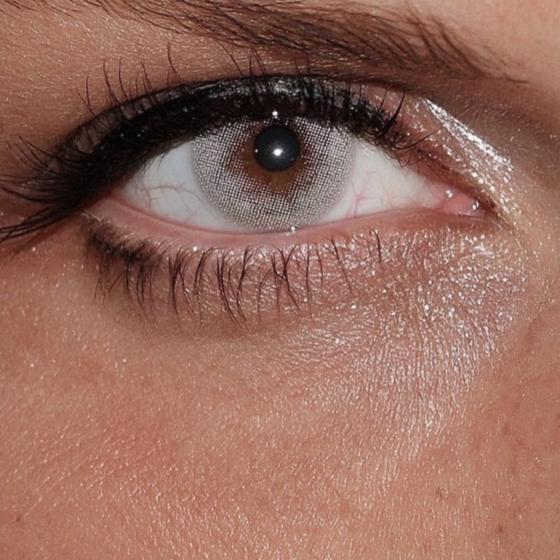 Surface Studies · by Jamey Gannon · eye macro, glossy skin, cherries