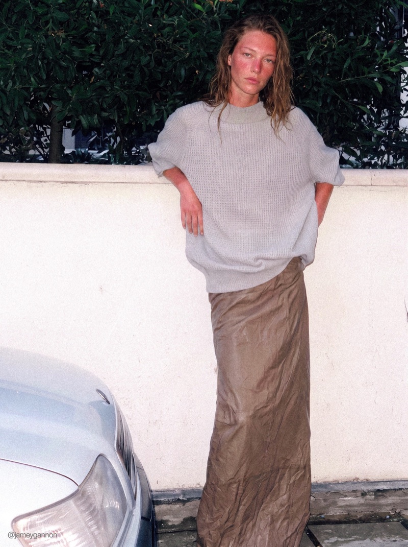 Street Portrait · by Jamey Gannon · grey t-shirt, satin skirt, hedge