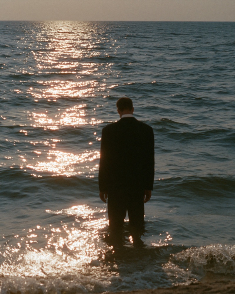 Suit in the Surf · by Julie W. Design · black suit, shoreline, backlit glitter