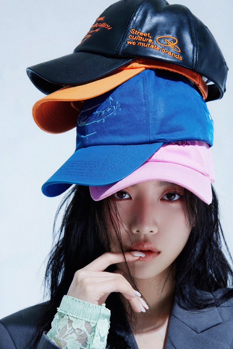 High-Key Props · by RABBAI · stacked caps, studio portrait, high-key light